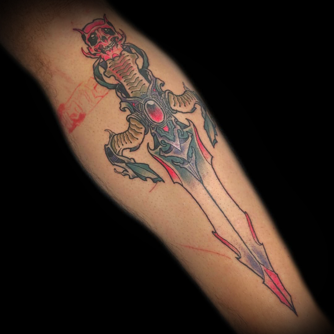Cyber dagger tattoo