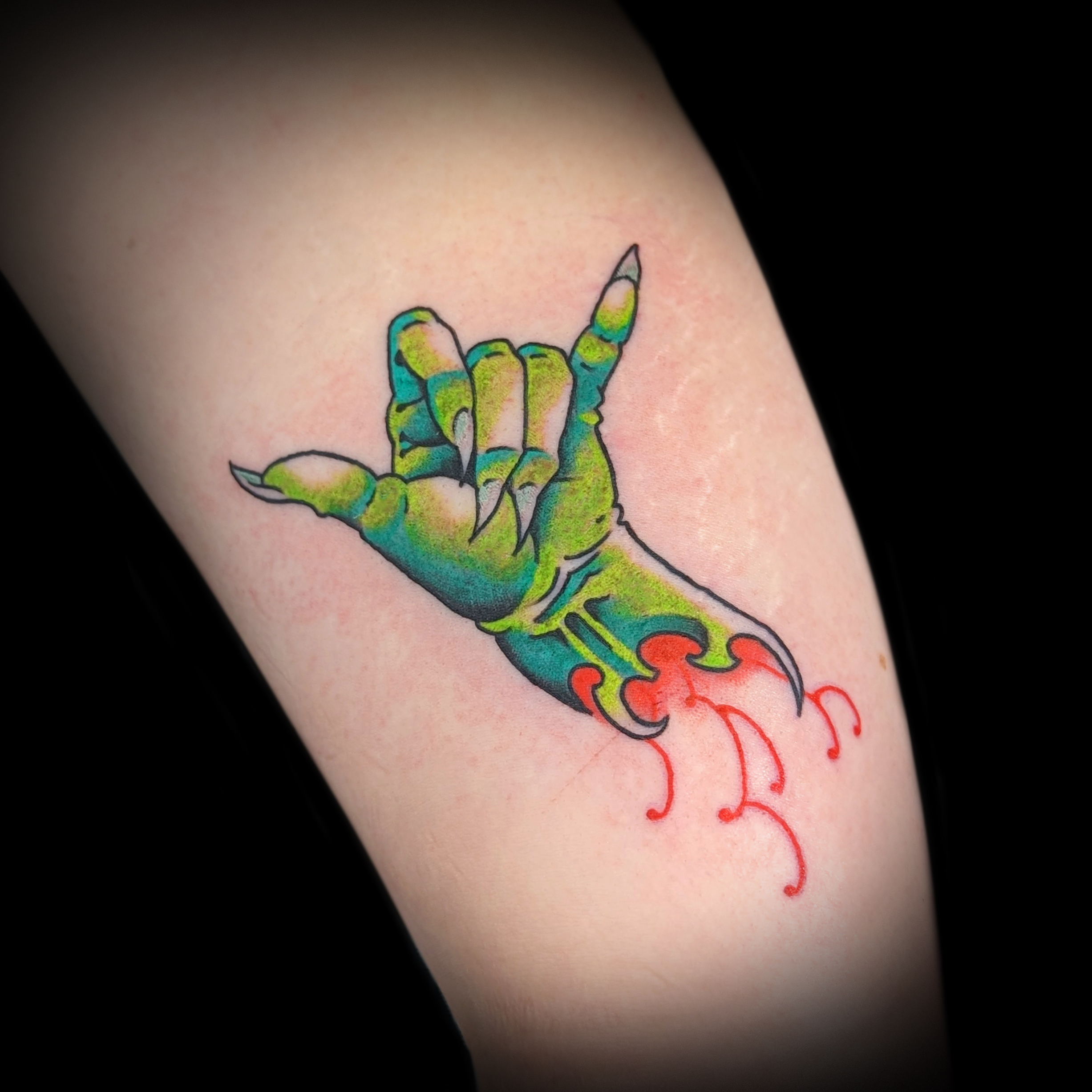 Hang loose hand tattoo